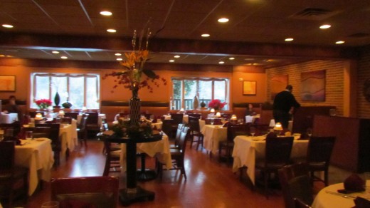 There is a  large spacious dinning area, with romantic lighting scattered about.
