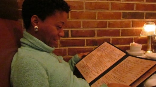 Our daughter Jaleesa, joined us for family night out. She looks through the menu with great anticipation.