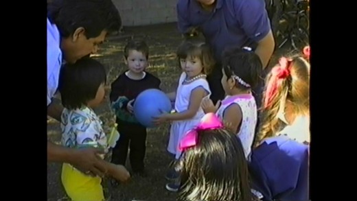 taken in 1990, birthday party game for the lil guy grabbing ball with the green and black sweater, too cute!