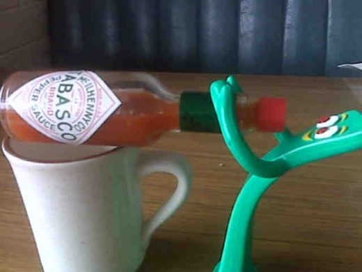 Gumby, hittin' the bottle again...sadly, he doesn't know it's tabasco.  :::sigh:::