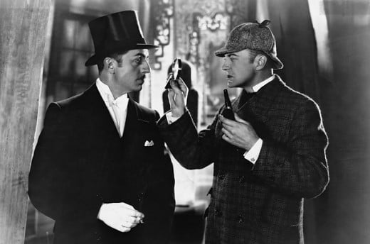 William Powell and John Barrymore as Sherlock Holmes and Dr. Watson