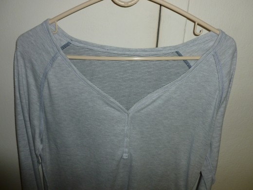 Plastic Hangers create hanger bumps in shoulder section of shirts.