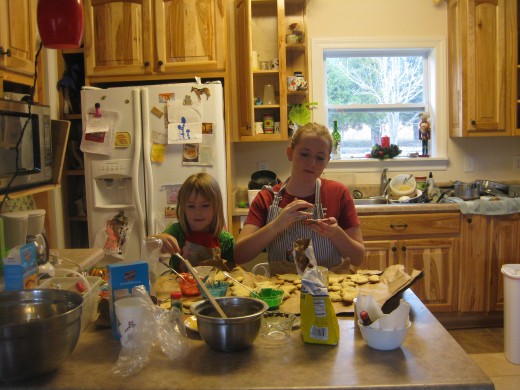 Betty and her sister Leona painting sugar cookies this Christmas.