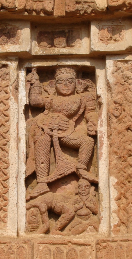 A goddess (?Kali with feet on Virupaakshya & Voirab)