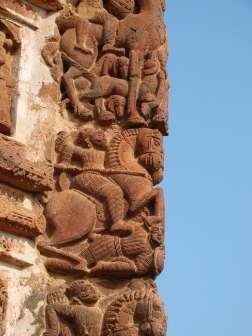 Terracotta work at the corner of the temple, called the BARSHAA art