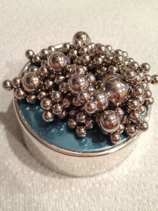 The magnetic sculpture kit.  What sculpture can I make with that?  A pile of balls?