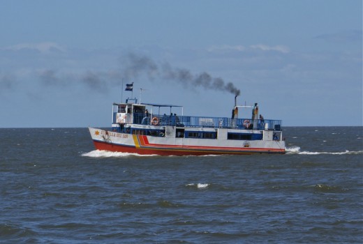 A ferry heading for San Jorge port on a day of calm seas.