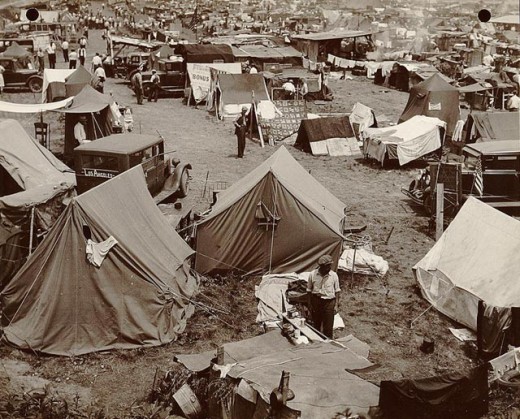 This is an earlier occupation that encamped across the river from the US capital. This was the Bonus Army that assembled in 1932. By 1933, the US army chased them out of the camp and destroyed the occupation.