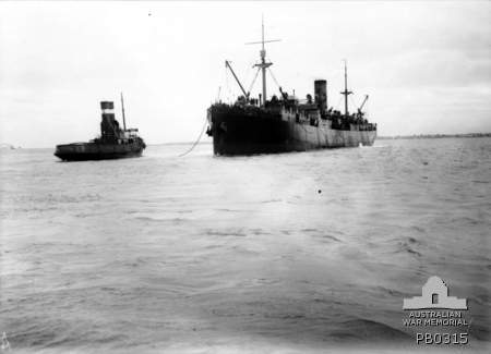 The HMAT Clan MacGillivray (A46) departing and being assisted by a tug. This was the ship that took my great grandfather to war.