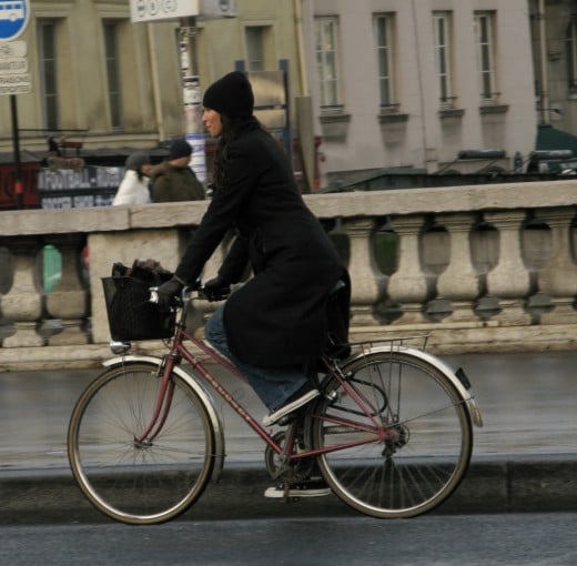 A woman on a bike in Paris