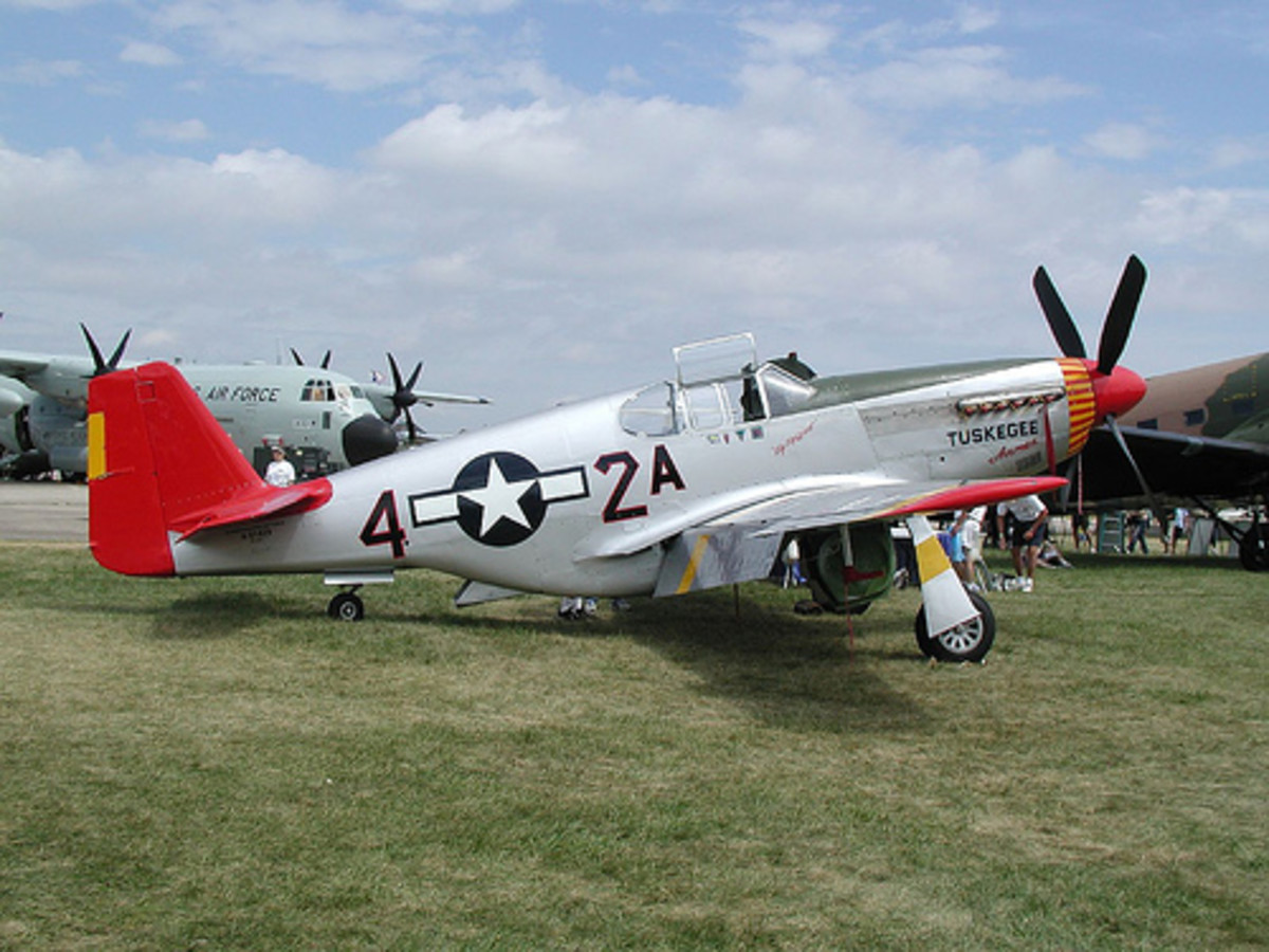 Red Tail P-51C. [The P-51C's replaced old broken down planes so the Tuskegee Airmen could do their jobs well. ]