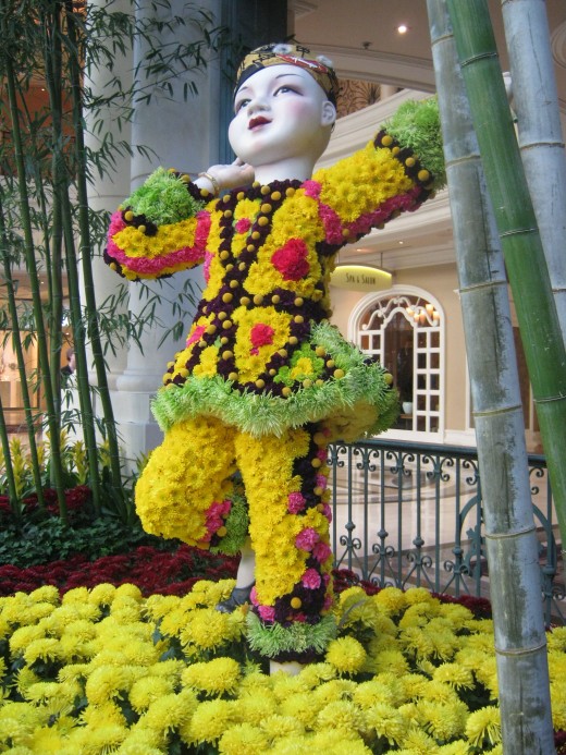 Chinese child made almost entirely of fresh flowers. Children are especially thrilled by the Celebration of Chinese New Year. All of these pictures were taken at the Bellagio Hotel Conservatory in Las Vegas.