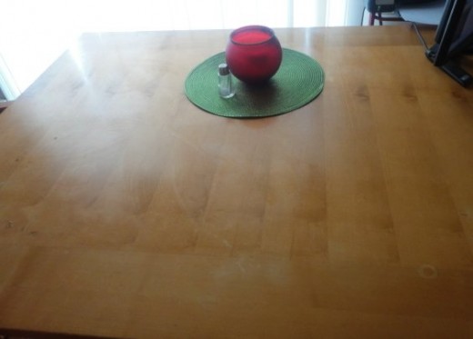 Here we have the after photo. No, I did not just sweep everything off the table and pile it on a chair. Though that was tempting. Nope, I put each item in its home. It took about five minutes.