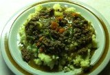 Hamburger Beef Stew or Mince Meat Stew on top of mashed potatoes
