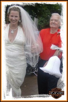 Dad walking My Wife down an isle of bikes at our wedding