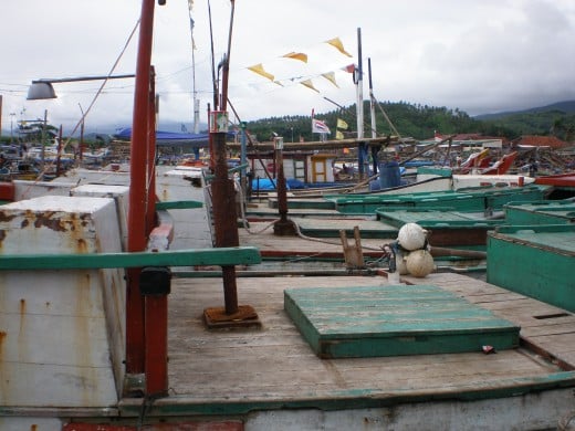 Quiet fishermen village, they mostly take a rest before they go fishing at night.