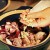 Put the sausage, onion and garlic in the casserole dish Put the sausage, onion and garlic in the casserole dish