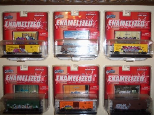 Toy freight cars a part of the 2006 graffiti diecast train collection  