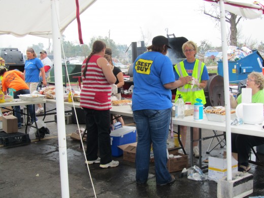 Free food offered by combined churches for survivors and volunteers.