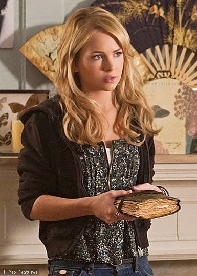 Cassie with Her Book of Shadows