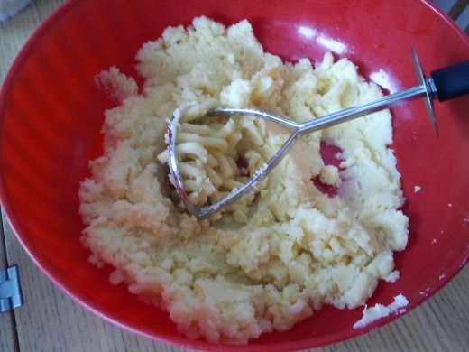 Mashed potatoes.  These are starchy potatoes and mash up fluffy.  That's what you want.