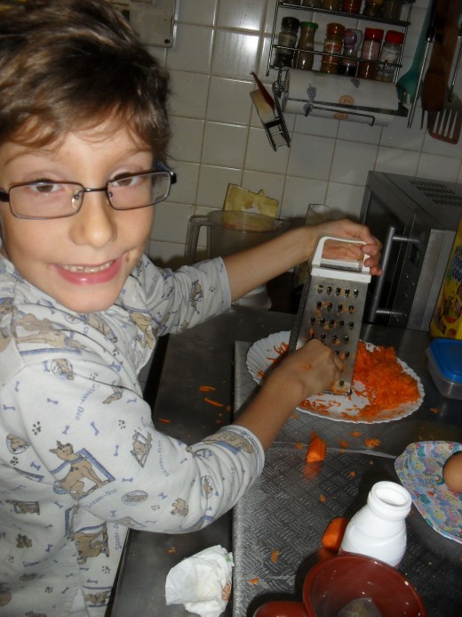 Grating carrots for a carrot salad