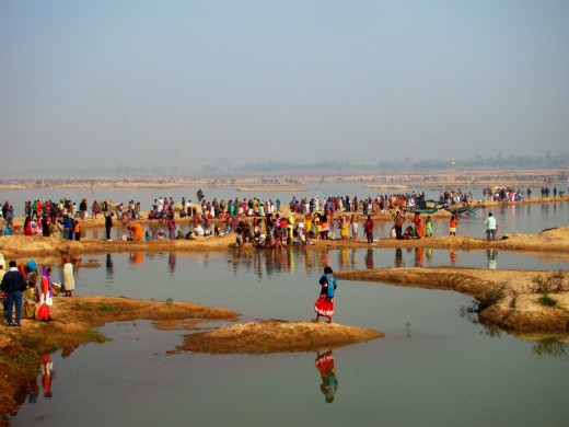 River Ajoy with pilgrims ready to have a holy dip