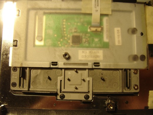 The left click button got loose. Two screws are used to fix it firmly.