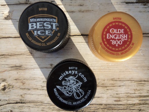 Some new laws in big cities requiring a wave of plastic beer bottles and bottle caps may soon make the beautifully painted metal bottle caps that we became accustomed to a thing of  the past. 
