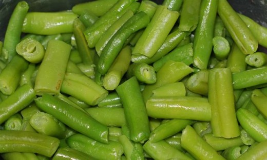 Cut Up Cooked Green Beans In This Photo