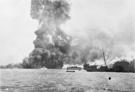 MV Neptuna exploding at Stokes Hill Wharf