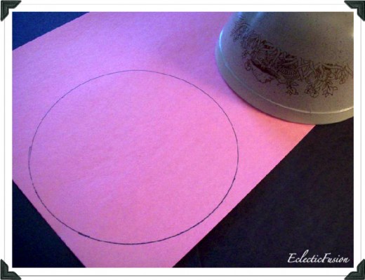 Trace a circle onto construction paper.