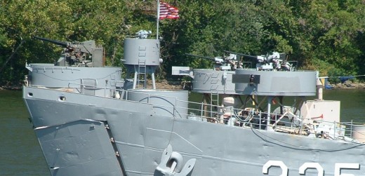 As originally designed, LSTs had an anti-aircraft armament of six 20mm guns, but this was soon increased as 40mm, 3-inch, and .50cal weapons were added to counter the air threat to these slow ships.