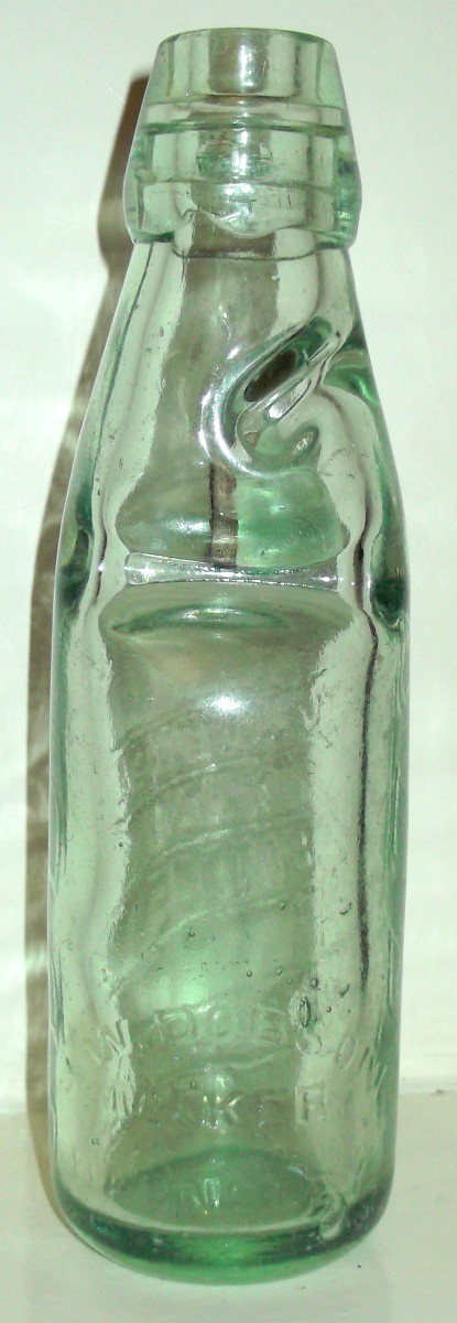 Hiram Codd, Designed a method of sealing a glass bottle, by means of a glass ball under gas pressure, from the carbonated fizzy drink. 10 Years before the invention of Coke