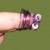 twist wire around fingers as shown but reserve several inches 