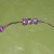 twist wire closed around one bead