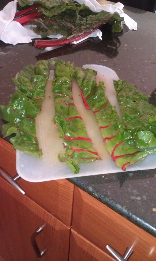 Cut the Kale or swiss chard into long strips.