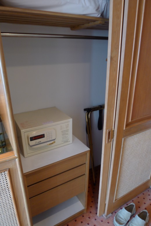 Electronic room safe, good enough to fit a small notebook computer.