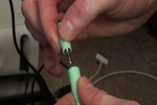 Plug the 1/8-inch green cable to the green connector on the audio extension cable.