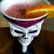 Jack's smoothie topped with cinnamon/sugar topping in a skull goblet and garnished with an orange slice