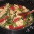 Stirring the cooked pasta together with the vegetables Stirring the cooked pasta together with the vegetables