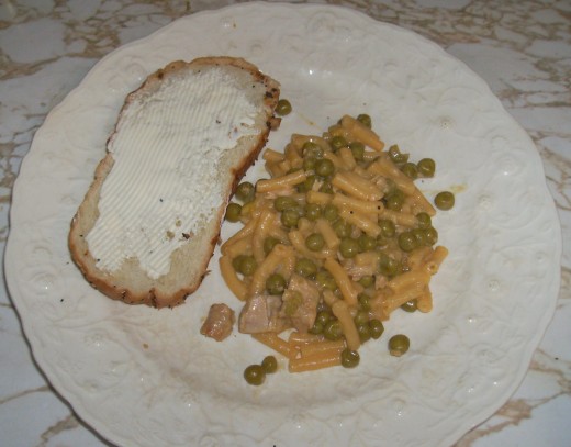 Macaroni and Cheese with Peas and Tuna All-in-one-Meal, complete with a slice of bread and butter!