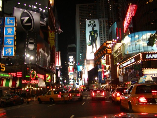 another night picure taken from the drivers seat of my limo, approaching Times Square   © Eric Heifetz