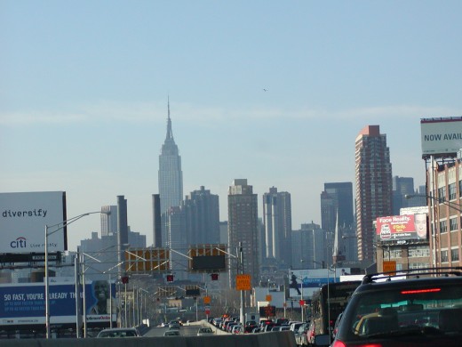 taken while driving ( stopped & no passengers ) ) into NYC on the BQE approaching the Midtown Tunnel, with the Empire State Building in the background   © Eric Heifetz