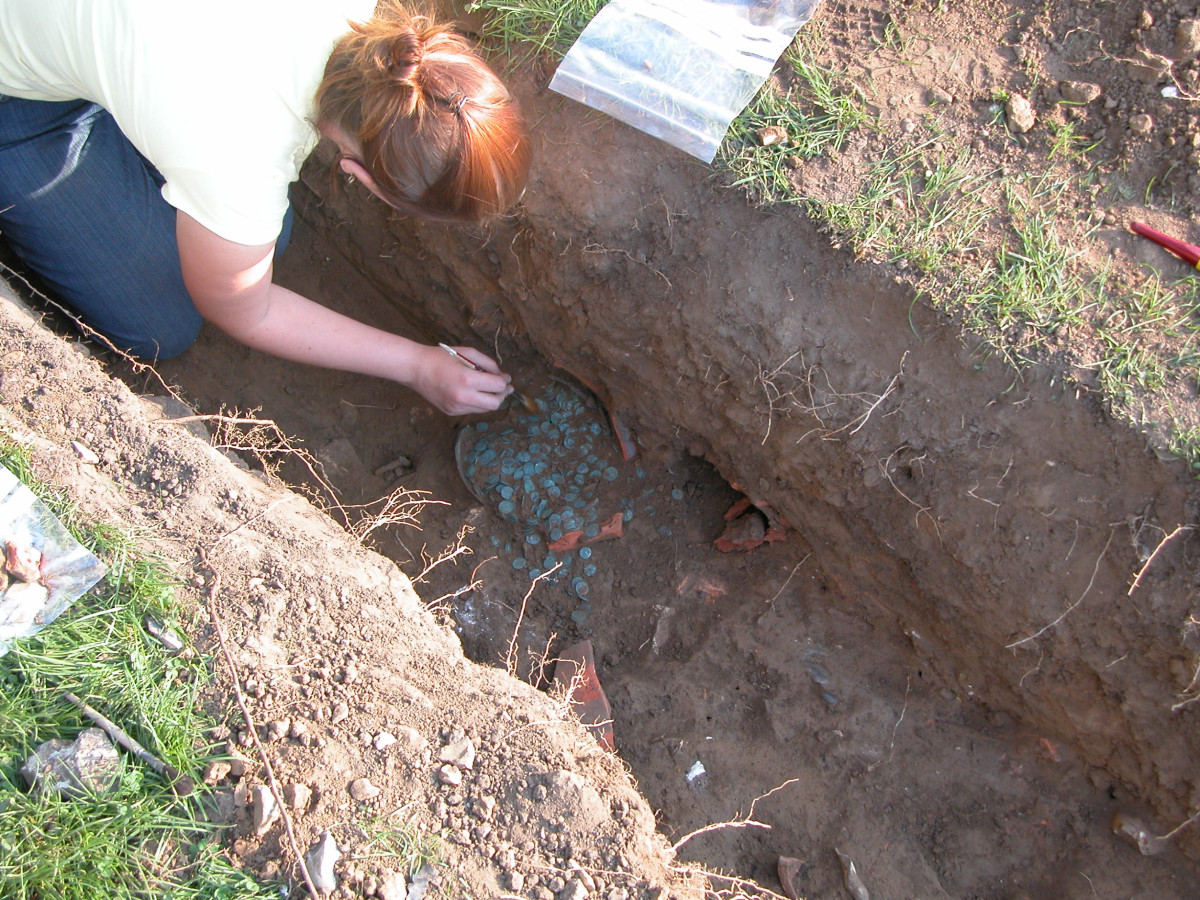 Snodland hoard being excavated by a fieldworker.