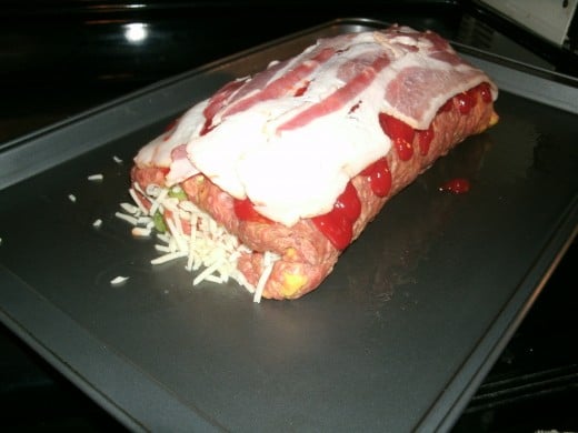 Meatloaf rolled up and ready to be baked.