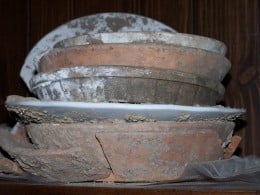  A stack of plates the escaping slaves ate from and then hid in the dirt floor of the basement. The basement was one of the hiding places during the years of the Underground Railroad.