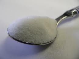 There are four grams of sugar in one teaspoon serving.