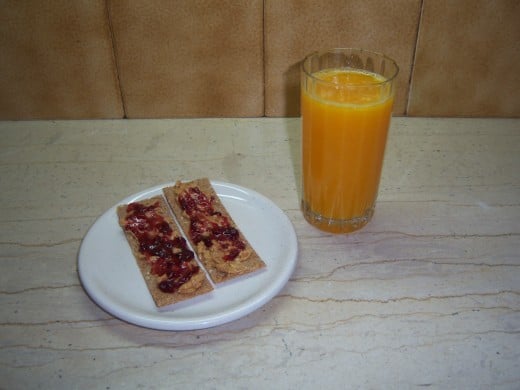 Fresh orange juice with wholegrain crackers....