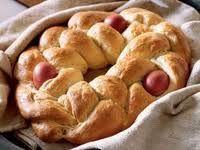 Another Easter Treat - pletenica.  Made from sirnica dough, it's a braided bread with uncooked eggs positioned within it, which cook during the baking process.  Some lucky children receive their very own (smaller) pletenica on Easter morning! 